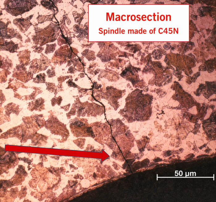 Macrosection of a C45N steel spindle showing a crack in the microstructure, scale bar 50 µm